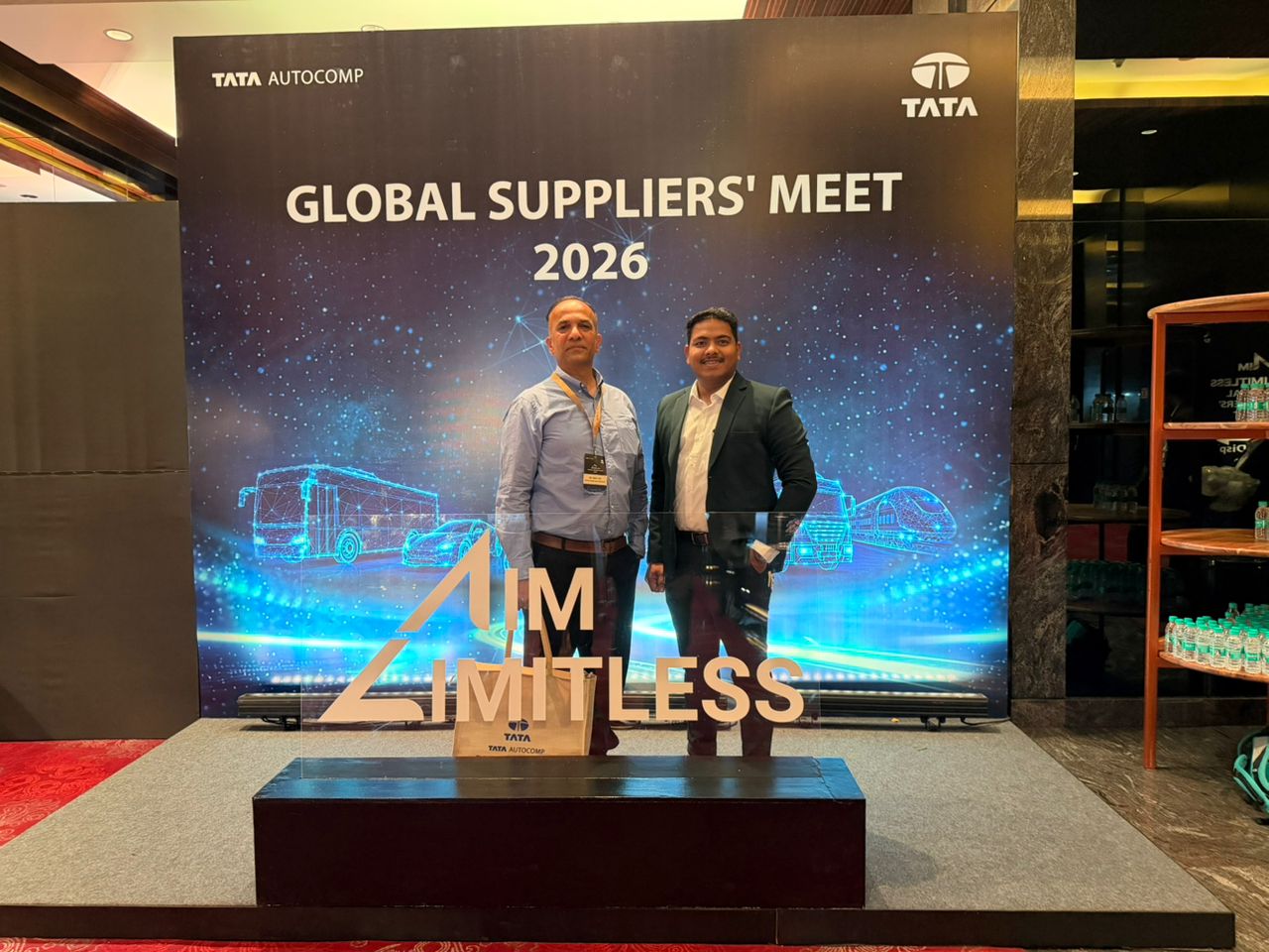 Photo at the TATA AutoComp Global Suppliers' Meet 2026 event backdrop